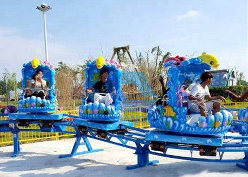Freizeitpark-Achterbahn im Freien, Kinderminiachterbahn-Ozean-Thema-spinnendes Schieben